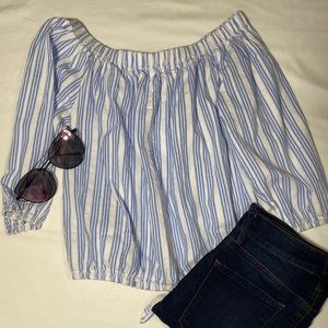 Off the shoulders stripped blue and white blouse.